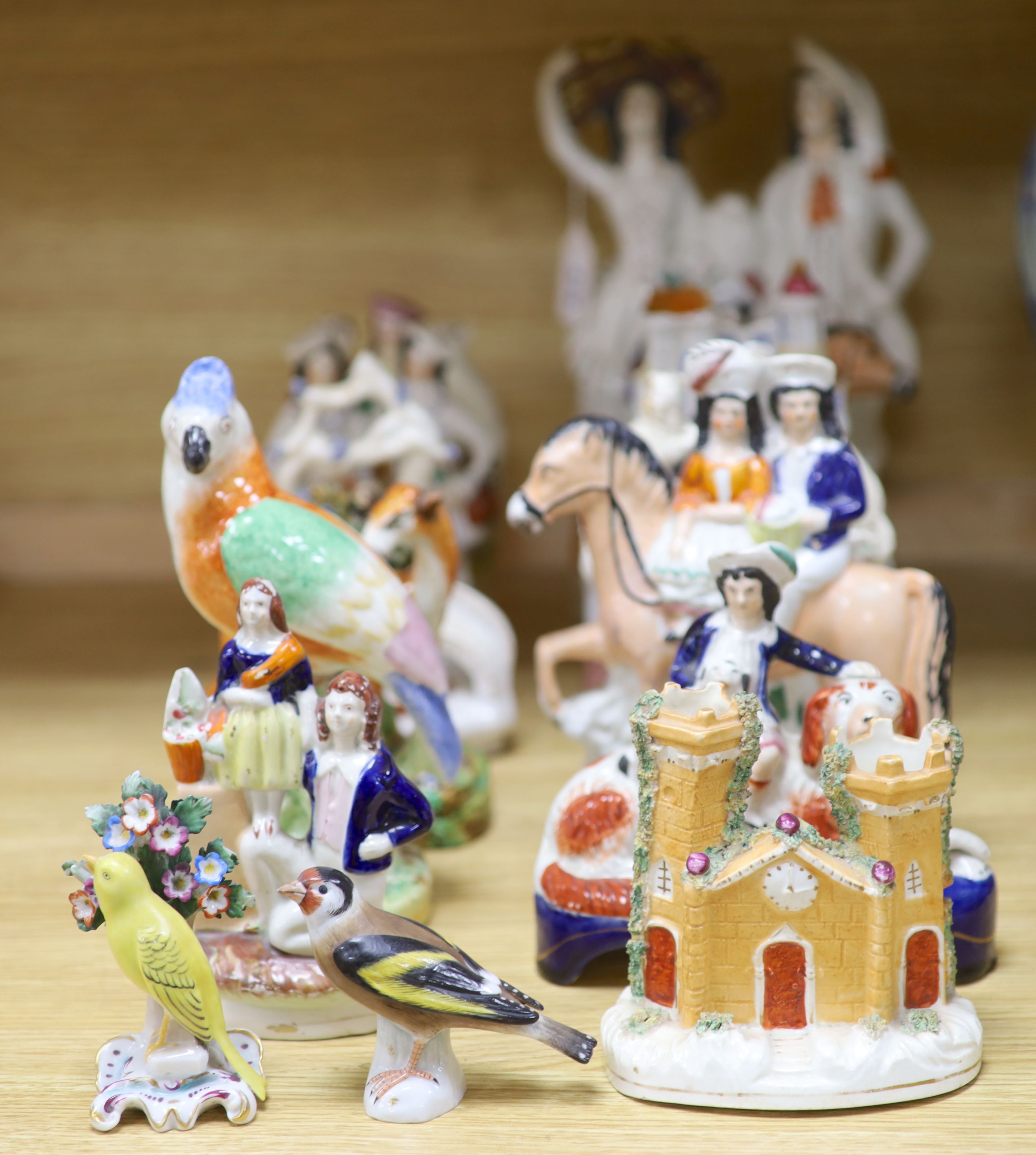 A collection of assorted Staffordshire figures and sundry ceramics including early 19th century Staffordshire pearlware deer, tallest 3